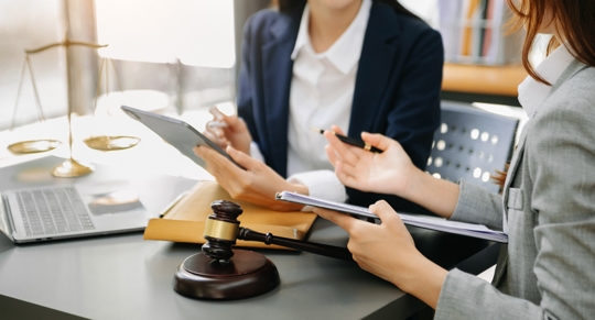 person consulting with an attorney